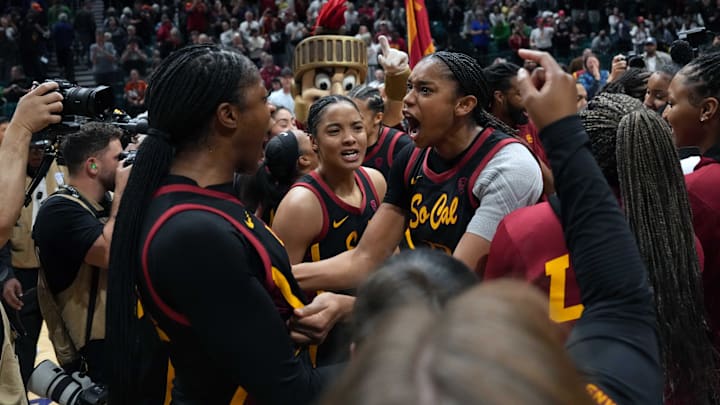 Mar 10, 2024; Las Vegas, NV, USA; Southern California Trojans center Clarice Akunwafo (left) celebrates with her teammates.