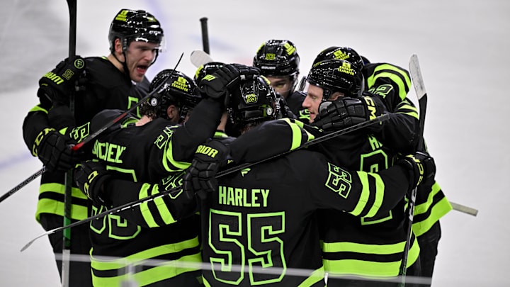 Mar 22, 2025; Dallas, Texas, USA; The Dallas Stars celebrate after defenseman Thomas Harley (55)  scores the game winning goal against the Philadelphia Flyers during the overtime period at the American Airlines Center. Mandatory Credit: Jerome Miron-Imagn Images
