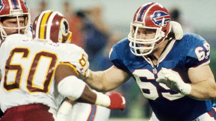 Jan 26, 1992; Minneapolis, MN, USA; FILE PHOTO; Buffalo Bills offensive tackle Will Wolford (69) in action against Washington Redskins defensive end Fred Stokes (60) during Super Bowl XXVI at the Metrodome. The Redskins defeated the Bills 37-24. Mandatory Credit: Manny Rubio-Imagn Images