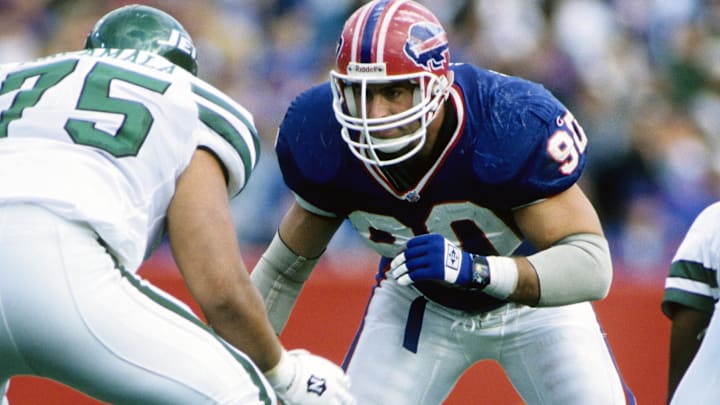 Oct 8, 1995; Orchard Park, NY, USA; Buffalo Bills defensive end Phil Hansen (90) in action against the New York Jets at Rich Stadium. FILE PHOTO; Mandatory Credit: Imagn Images Oct 8, 1995; Orchard Park, NY, USA; Buffalo Bills defensive end Phil Hansen (90) in action against the New York Jets at Rich Stadium. FILE PHOTO; Mandatory Credit: Imagn Images