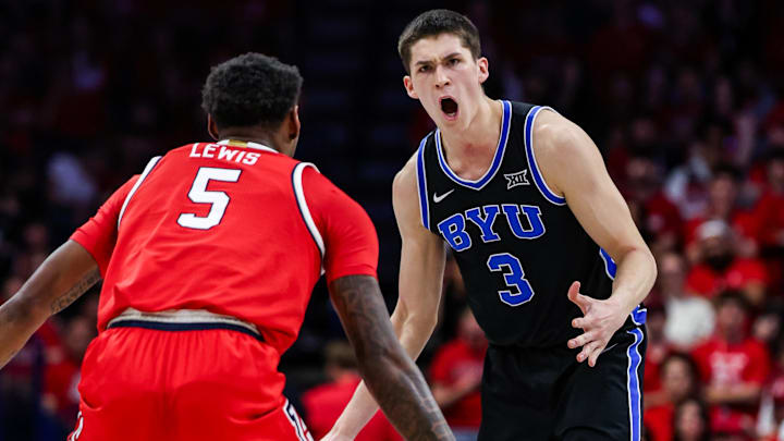 Feb 22, 2025; Tucson, Arizona, USA; BYU Cougars guard Egor Demin (3) yells towards his teammates while Arizona Wildcats guard KJ Lewis (5) is ready to block him during the first half at McKale Center. Mandatory Credit: Aryanna Frank-Imagn Images