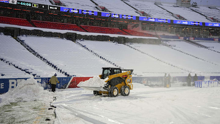 Dec 1, 2024; Orchard Park, New York, USA;  Snow clearing equipment clears the field of snow prior to a game between the San Francisco 49ers and the Buffalo Bills at Highmark Stadium. Mandatory Credit: Gregory Fisher-Imagn Images
