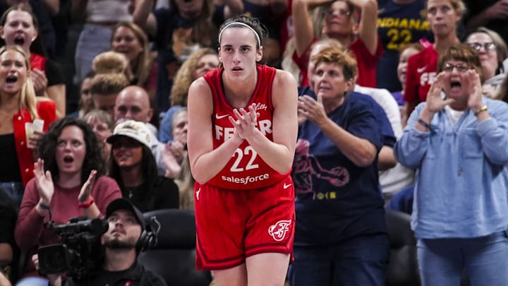 Sep 13, 2024; Indianapolis, Indiana, USA; Indiana Fever guard Caitlin Clark (22) celebrates while on defense Friday, Sept. 13, 2024, during a game between the Indiana Fever and the Las Vegas Aces on Friday, Sept. 13, 2024, at Gainbridge Fieldhouse in Indianapolis. The Aces defeated the Fever, 78-74.  Mandatory Credit:  Grace Smith/USA TODAY Network via Imagn Images