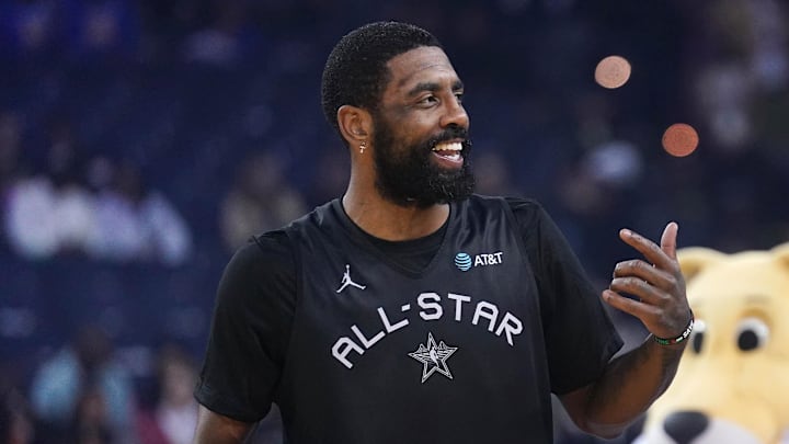 Feb 15, 2025; Oakland, CA, USA; Shaq’s OGs guard Kyrie Irving (11) of the Dallas Mavericks interacts with forward Jayson Tatum (0) of the Boston Celtics during the NBA All Star-Practice at Oracle Arena. Mandatory Credit: Cary Edmondson-Imagn Images
