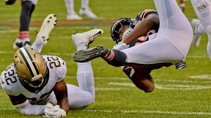 Tarik Cohen is tackled by former New Orleans defensive back Chauncey Gardner-Johnson, who is now a Bear. Tarik Cohen is tackled by former New Orleans defensive back Chauncey Gardner-Johnson, who is now a Bear.