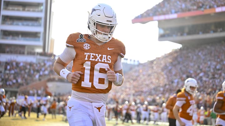Dec 21, 2024; Austin, Texas, USA; Texas Longhorns quarterback Arch Manning (16) takes the field before the game between the Texas Longhorns and the Clemson Tigers in the CFP National Playoff First Round at Darrell K Royal-Texas Memorial Stadium. Mandatory Credit: Jerome Miron-Imagn Images