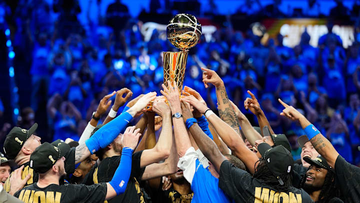 Jun 22, 2025; Oklahoma City, Oklahoma, USA; The Oklahoma City Thunder lift the Larry O'Brien Championship Trophy as they celebrate after winning game seven of the 2025 NBA Finals against the Indiana Pacers at Paycom Center. Mandatory Credit: Kyle Terada-Imagn Images