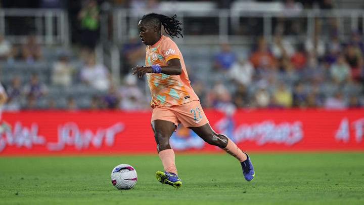 Jun 20, 2025; Louisville, Kentucky, USA;  Orlando Pride forward Barbra Banda (22) dribbles the ball during the second half against Racing Louisville FC at Lynn Family Stadium. Mandatory Credit: EM Dash-Imagn Images