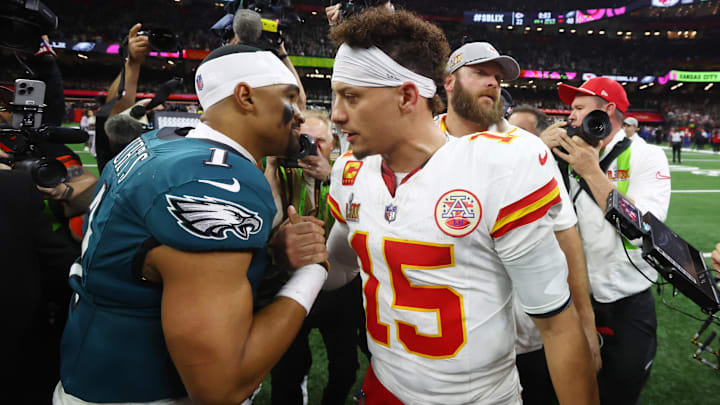 Feb 9, 2025; New Orleans, LA, USA; Philadelphia Eagles quarterback Jalen Hurts (1) shakes hands with Kansas City Chiefs quarterback Patrick Mahomes (15) after Super Bowl LIX at Ceasars Superdome. Mandatory Credit: Mark J. Rebilas-Imagn Images
