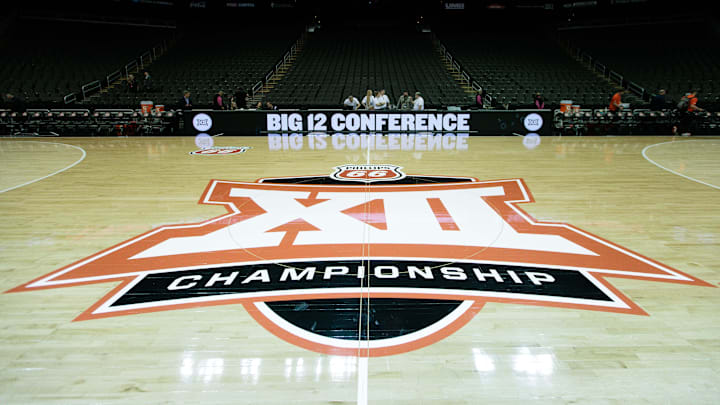 Mar 12, 2024; Kansas City, MO, USA; Big 12 Championship logo at center court prior to the game between the UCF Knights and the Oklahoma State Cowboys at T-Mobile Center. Mandatory Credit: William Purnell-Imagn Images