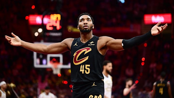 Nov 21, 2025; Cleveland, Ohio, USA; Cleveland Cavaliers guard Donovan Mitchell (45) reacts after a basket against the Indiana Pacers during the second half at Rocket Arena. Mandatory Credit: Ken Blaze-Imagn Images