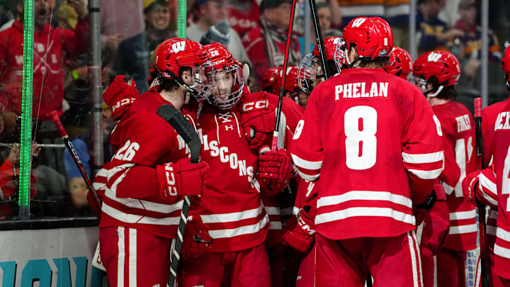 Apr 9, 2026; Las Vegas, Nevada, UNITED STATES; Wisconsin Badgers defenseman Aiden Dubinsky (28) celebrates defeating North Dakota Fighting Hawks in the semifinals of the NCAA men's ice hockey Frozen Four at T-Mobile Arena. Mandatory Credit: Stephen R. Sylvanie-Imagn Images