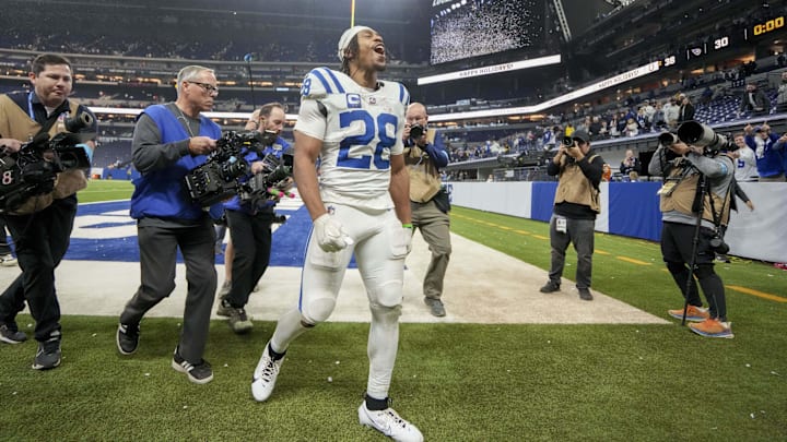 Dec 22, 2024; Indianapolis, Indiana, USA; Indianapolis Colts running back Jonathan Taylor (28) celebrates as he leaves the field after winning a game against the Tennessee Titans at Lucas Oil Stadium. Mandatory Credit: Grace Hollars/USA Today Network via Imagn Images 