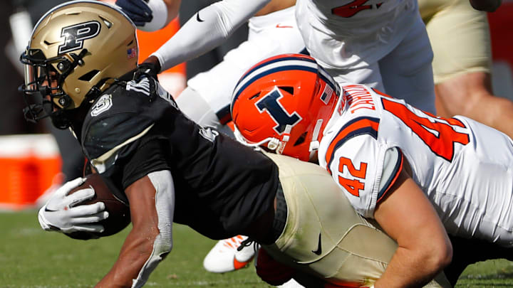 Purdue Boilermakers running back Tyrone Tracy Jr. (3) is tackled by llinois Fighting Illini linebacker Luke Zardzin (42) during the NCAA football game, Saturday, Sept. 30, 2023, at Ross-Ade Stadium in West Lafayette, Ind. Purdue Boilermakers won 44-19. Purdue Boilermakers running back Tyrone Tracy Jr. (3) is tackled by llinois Fighting Illini linebacker Luke Zardzin (42) during the NCAA football game, Saturday, Sept. 30, 2023, at Ross-Ade Stadium in West Lafayette, Ind. Purdue Boilermakers won 44-19.