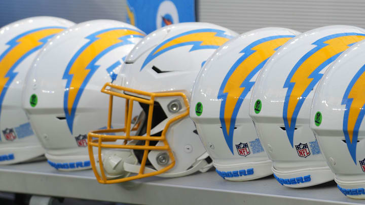 Aug 12, 2023; Inglewood, California, USA; Los Angeles Chargers helmets on the bench at SoFi Stadium. Mandatory Credit: Kirby Lee-Imagn Images
