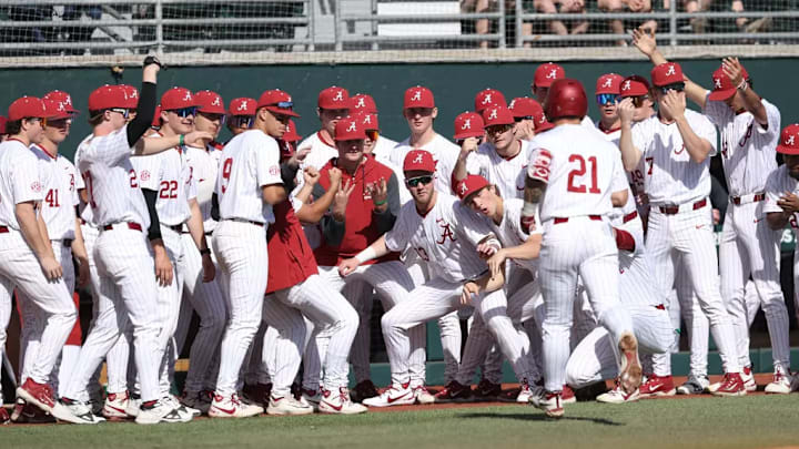 Alabama baseball players celebrate in a game against North Dakota State.