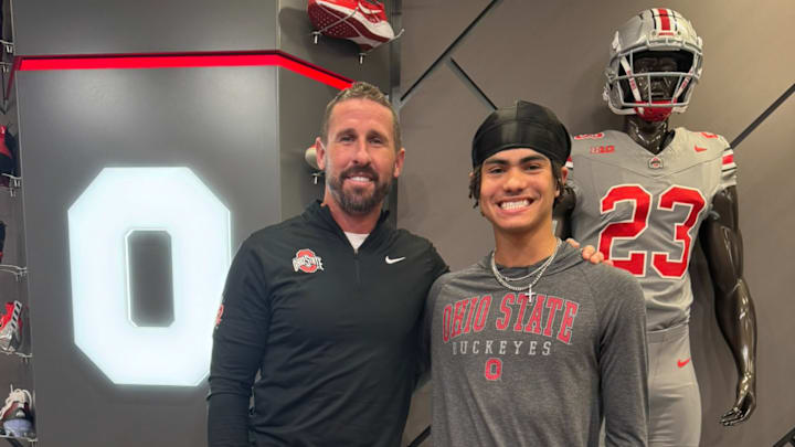 Moorhead Spuds wide receiver David Mack with Ohio State offensive coordinator Brian Hartline. 