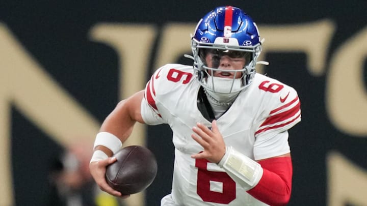 Oct 5, 2025; New Orleans, Louisiana, USA; New York Giants quarterback Jaxson Dart (6) runs the ball against the New Orleans Saints during the second quarter at Caesars Superdome.  