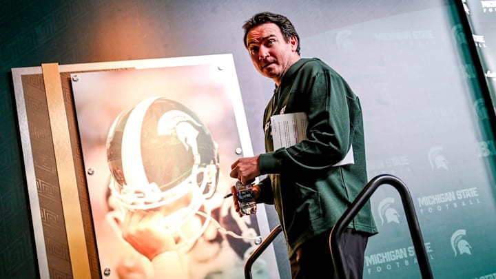 Michigan State coach Jonathan Smith leaves the podium after his press conference on the first