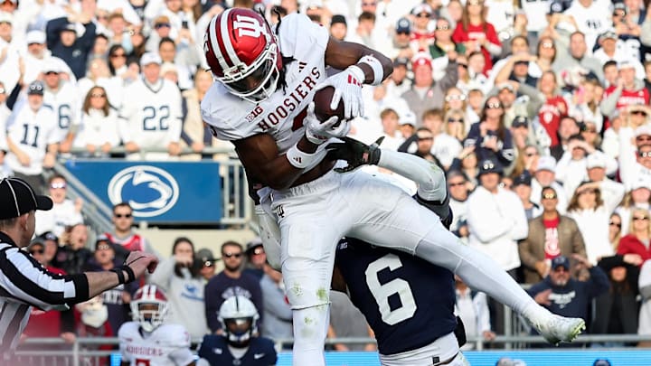 Nov 8, 2025; University Park, Pennsylvania, USA; Indiana Hoosiers wide receiver Omar Cooper Jr. (3) makes a catch in the end zone for a touchdown during the fourth quarter against the Penn State Nittany Lions at Beaver Stadium. Mandatory Credit: Matthew O'Haren-Imagn Images Nov 8, 2025; University Park, Pennsylvania, USA; Indiana Hoosiers wide receiver Omar Cooper Jr. (3) makes a catch in the end zone for a touchdown during the fourth quarter against the Penn State Nittany Lions at Beaver Stadium. Mandatory Credit: Matthew O'Haren-Imagn Images