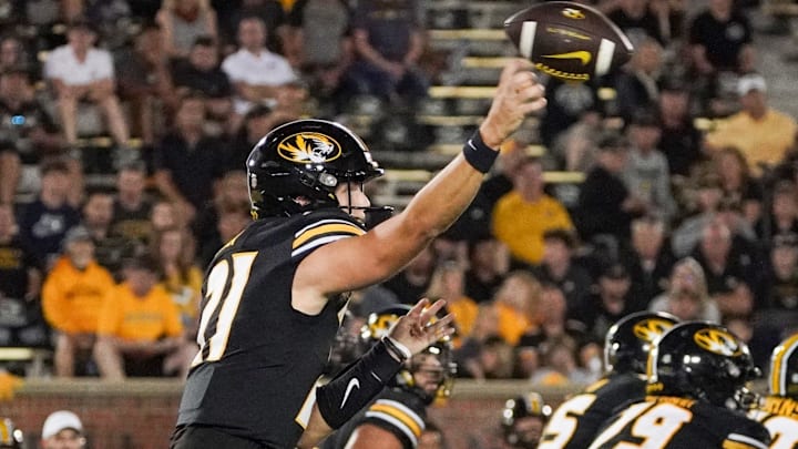 Aug 31, 2023; Columbia, Missouri, USA; Missouri Tigers quarterback Sam Horn (21) throws a pass against the South Dakota Coyotes during the second half at Faurot Field at Memorial Stadium. Mandatory Credit: Denny Medley-Imagn Images