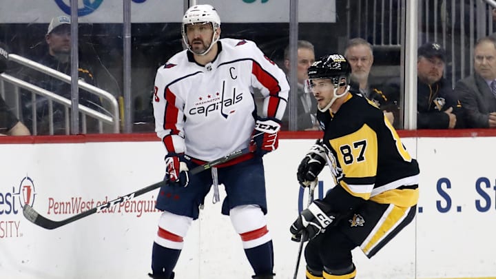 Mar 25, 2023; Pittsburgh, Pennsylvania, USA; Washington Capitals left wing Alex Ovechkin (8) and Pittsburgh Penguins center Sidney Crosby (87) look for the puck during the third period at PPG Paints Arena. Pittsburgh won 4-3. Mandatory Credit: Charles LeClaire-Imagn Images Mar 25, 2023; Pittsburgh, Pennsylvania, USA; Washington Capitals left wing Alex Ovechkin (8) and Pittsburgh Penguins center Sidney Crosby (87) look for the puck during the third period at PPG Paints Arena. Pittsburgh won 4-3. Mandatory Credit: Charles LeClaire-Imagn Images