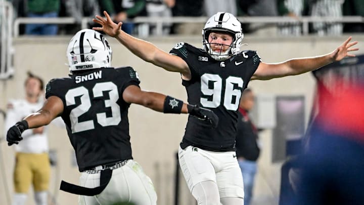Michigan State's Ryan Eckley, right, celebrates a deep punt with teammate Darius Snow during the fourth quarter in the game against Boston College on Saturday, Sept. 6, 2025, at Spartan Stadium in East Lansing.