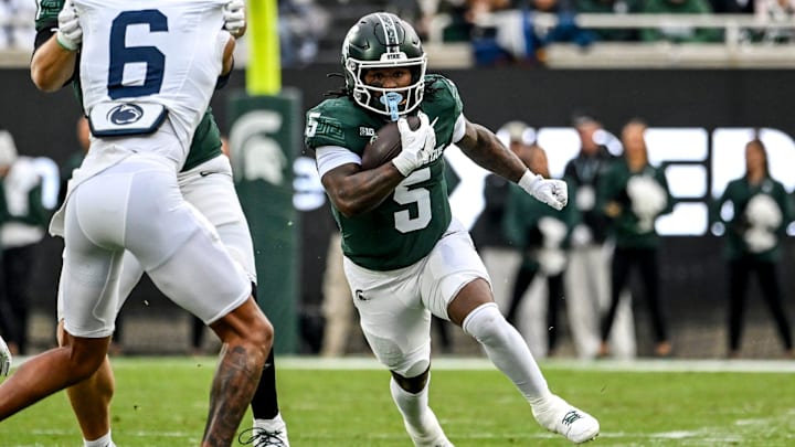 Michigan State's Makhi Frazier runs for a gain against Penn State during the first quarter on Saturday, Nov. 15, 2025, at Spartan Stadium in East Lansing. Michigan State's Makhi Frazier runs for a gain against Penn State during the first quarter on Saturday, Nov. 15, 2025, at Spartan Stadium in East Lansing.