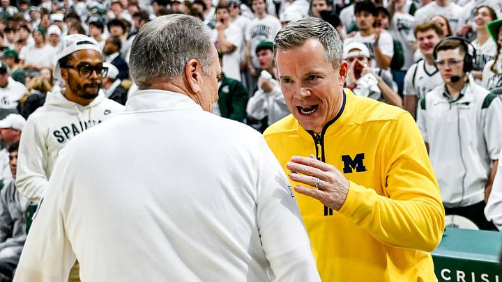 Michigan State's head coach Tom Izzo, left, and Michigan's head coach Dusty May meet before the game on Friday, Jan. 30, 2026, at the Breslin Center in East Lansing.