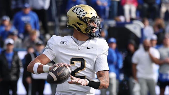 Nov 29, 2025; Provo, Utah, USA; UCF Knights quarterback Tayven Jackson (2) passes against the UCF Knights during the second quarter at LaVell Edwards Stadium. Mandatory Credit: Rob Gray-Imagn Images