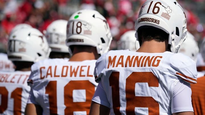 Texas Longhorns quarterbacks Arch Manning and Matthew Caldwell take the field for warm ups against Ohio State. Texas Longhorns quarterbacks Arch Manning and Matthew Caldwell take the field for warm ups against Ohio State.