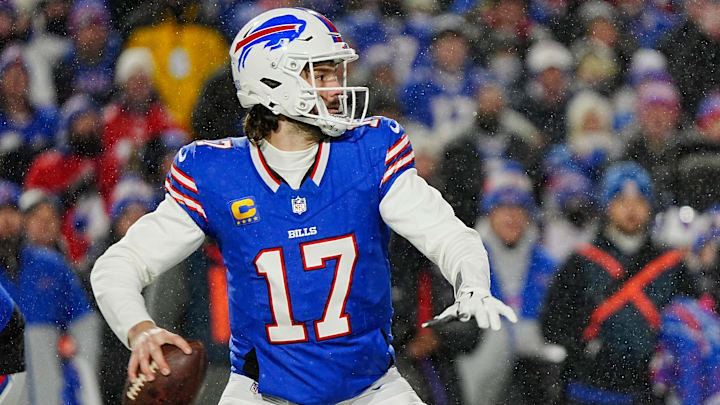 Buffalo Bills quarterback Josh Allen, ready to throw a pass, watches his receiver get into a position during first half action at the Buffalo Bills divisional game against the Baltimore Ravens at Highmark Stadium in Orchard Park on Jan. 19, 2025.