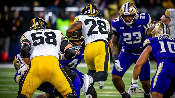 UW linebacker Zaydrius Rainey-Sale (23) comes up take on Iowa back Kamari Moulton. UW linebacker Zaydrius Rainey-Sale (23) comes up take on Iowa back Kamari Moulton.