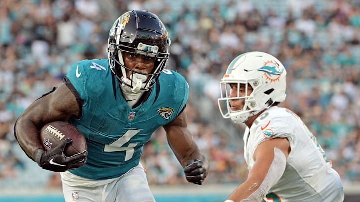 Aug 26, 2023; Jacksonville, Florida, USA; Jacksonville Jaguars running back Tank Bigsby (4) runs the