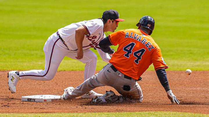 Houston Astros left fielder Yordan Alvarez slides into second base under Atlanta Braves shortstop Ha-Seong Kim (9) after hitting a double during the first inning at Truist Park. Mandatory Credit: Dale Zanine-Imagn Images Houston Astros left fielder Yordan Alvarez slides into second base under Atlanta Braves shortstop Ha-Seong Kim (9) after hitting a double during the first inning at Truist Park. Mandatory Credit: Dale Zanine-Imagn Images