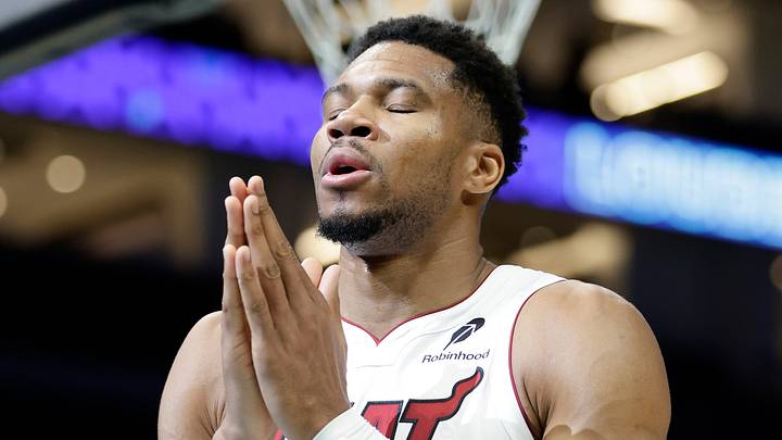 Oct 24, 2026; Charlotte, North Carolina, USA;  Miami Heat forward Giannis Antetokounmpo (7) says a prayer prior to the start of the game against the Charlotte Hornets at Spectrum Center.  Mandatory Credit: Brian Westerholt-Imagn Images