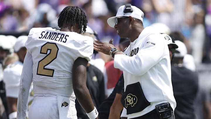 Sep 2, 2023; Fort Worth, Texas, USA; Colorado Buffaloes head coach Deion Sanders talks to