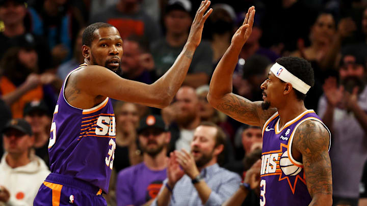 Mar 3, 2024; Phoenix, Arizona, USA; Phoenix Suns forward Kevin Durant (35) celebrates with guard Bradley Beal (3) during the first quarter of the game against the Oklahoma City Thunder at Footprint Center. Mandatory Credit: Mark J. Rebilas-Imagn Images