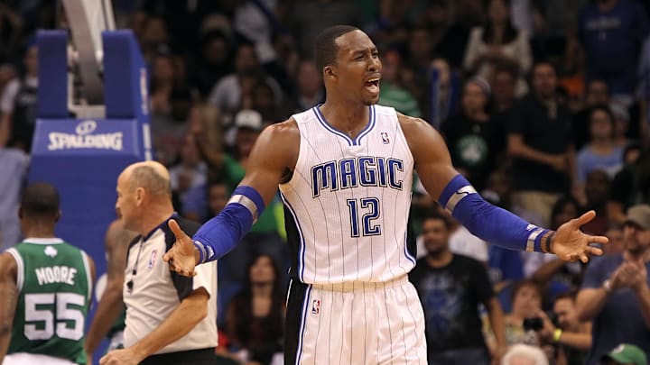 January 26, 2012; Orlando FL, USA; Orlando Magic center Dwight Howard (12) reacts after he gets called for a technical foul during the second half against the Boston Celtics at Amway Center. Boston Celtics defeated the Orlando Magic 91-83. Mandatory Credit: Kim Klement-Imagn Images