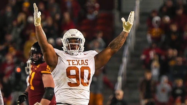 Nov 18, 2023; Ames, Iowa, USA; Texas Longhorns defensive lineman Byron Murphy II (90) celebrates