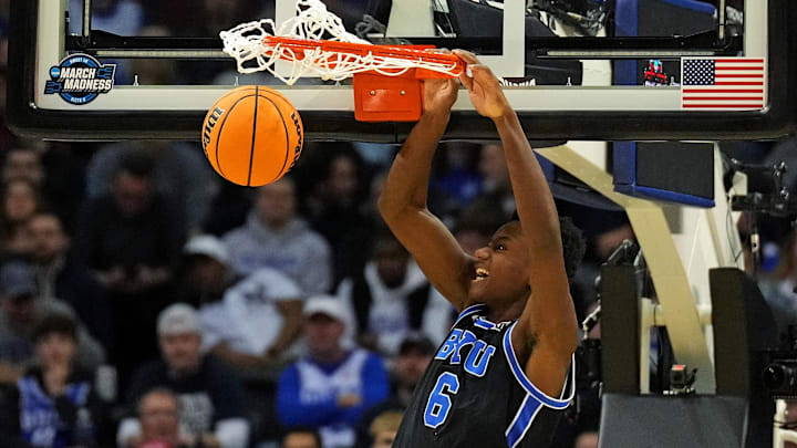 Mar 27, 2025; Newark, NJ, USA; Brigham Young Cougars forward Kanon Catchings (6) dunks the ball during the first half against the Alabama Crimson Tide during an East Regional semifinal of the 2025 NCAA tournament at Prudential Center. 