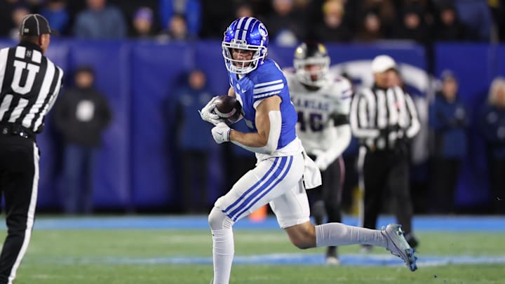 Nov 16, 2024; Provo, Utah, USA; Brigham Young Cougars wide receiver Chase Roberts (2) runs after a catch against the Kansas Jayhawks during the fourth quarter at LaVell Edwards Stadium. Mandatory Credit: Rob Gray-Imagn Images