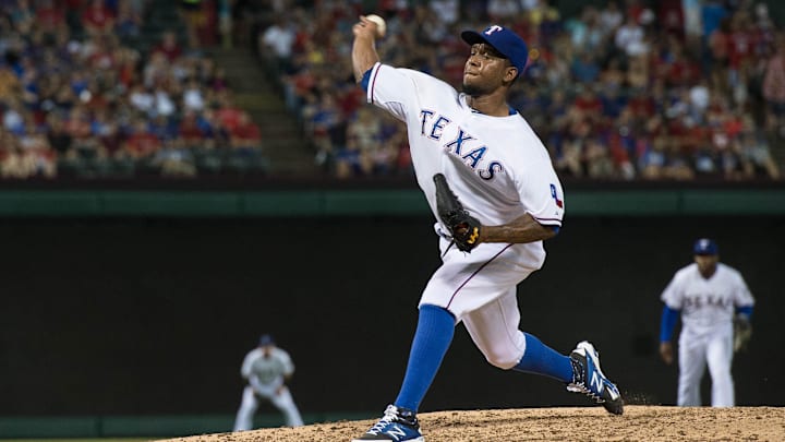 Jul 3, 2015; Arlington, TX, USA; Texas Rangers relief pitcher Neftali Feliz (30) pitches against the Los Angeles Angels during the game at Globe Life Park in Arlington. The Angels defeated the Rangers 8-2.