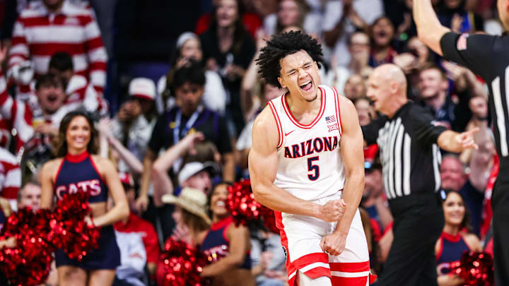 Feb 7, 2026; Tucson, Arizona, USA; Arizona Wildcats guard Brayden Burries (5) celebrates during the first half of the game against the Oklahoma State Cowboys at McKale Memorial Center.