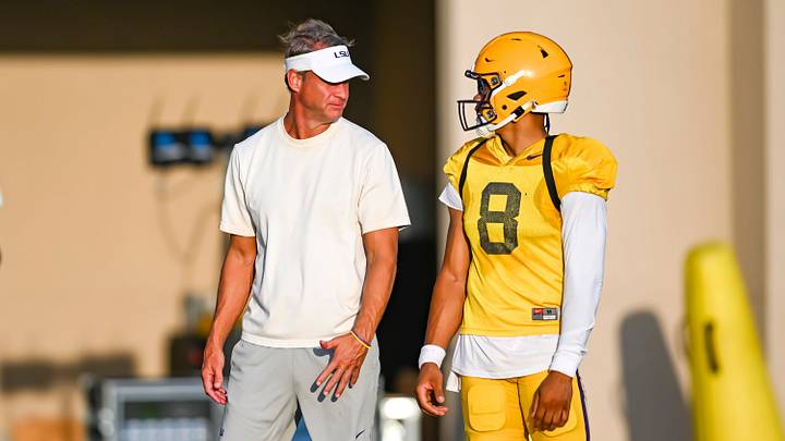 LSU Tigers head football coach Lane Kiffin talking with Quarterback Husan Longstreet 8 at LSU Football practice. August 18, 2026.