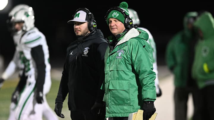Mogadore coaches look on during an OHSAA Division VI regional final in 2022. The Wildcats drop to Division VII for the upcoming season.