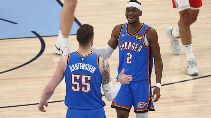 Apr 26, 2025; Memphis, Tennessee, USA; Oklahoma City Thunder guard Shai Gilgeous-Alexander (2) reacts with Oklahoma City Thunder center Isaiah Hartenstein (55) during a time out during the first quarter against the Memphis Grizzlies during game four for the first round of the 2024 NBA Playoffs at FedExForum. Mandatory Credit: Petre Thomas-Imagn Images Apr 26, 2025; Memphis, Tennessee, USA; Oklahoma City Thunder guard Shai Gilgeous-Alexander (2) reacts with Oklahoma City Thunder center Isaiah Hartenstein (55) during a time out during the first quarter against the Memphis Grizzlies during game four for the first round of the 2024 NBA Playoffs at FedExForum. Mandatory Credit: Petre Thomas-Imagn Images