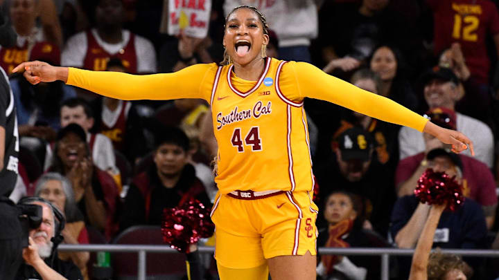 Mar 24, 2025; Los Angeles, California, USA; USC Trojans forward Kiki Iriafen (44) celebrates scoring in the third quarter against the Mississippi State Bulldogs during an NCAA Tournament second round game at Galen Center. Mandatory Credit: Robert Hanashiro-Imagn Images