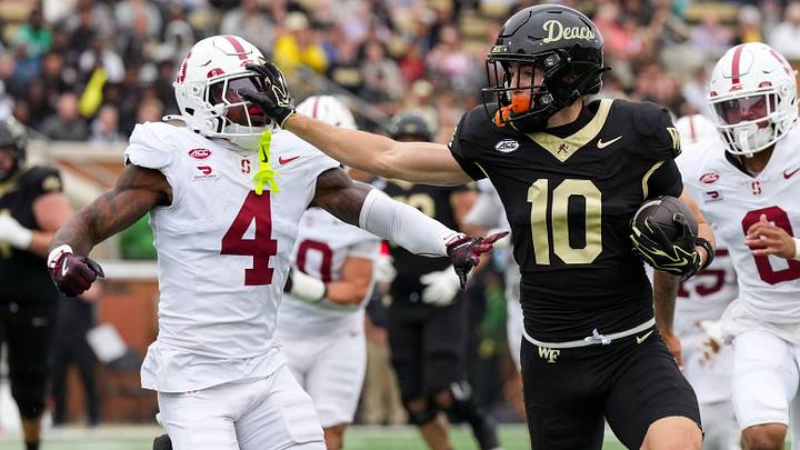Oct 3, 2026; Winston-Salem, North Carolina, USA; Wake Forest Demon Deacons wide receiver Jack Foley (10) stiff arms Stanford Cardinal cornerback Leroy Bryant (4) during the first half at Allegacy Federal Credit Union Stadium. Mandatory Credit: Jim Dedmon-Imagn Images Oct 3, 2026; Winston-Salem, North Carolina, USA; Wake Forest Demon Deacons wide receiver Jack Foley (10) stiff arms Stanford Cardinal cornerback Leroy Bryant (4) during the first half at Allegacy Federal Credit Union Stadium. Mandatory Credit: Jim Dedmon-Imagn Images