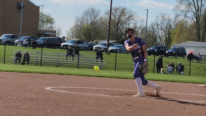 Champion pitcher Gabby Gradishar delivers a pitch during a game on April 22, 2024.